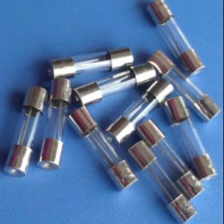 2 Amp 5mm x 20mm Cartridge Fuse 5X20 - shown as a pile of multiple clear glass cylindrical fuses with silver metal end caps on a blue background.