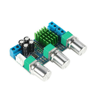 2 Channel Digital Power Amplifier Board 2x80w XH-M567 TPA3116D2 Audio Control Amplifier - a blue circuit board with three silver knobs, a green heatsink, and blue terminals.