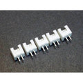 2 Pin 2.54mm JST Xh Style PCB Mount Male Connector - five white plastic two-pin male connectors arranged in a row on a dark surface.