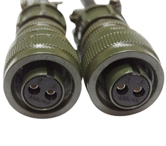 2 Pin Military Connector - Durable & Reliable Connections | Digilog.pk - a close-up view of two olive green circular connectors with two metal pins each, featuring black inserts with visible markings.