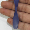2 Vane Propellor For Small Toy Motor - shown as a close-up of a single purple plastic two-blade propeller held in a hand.