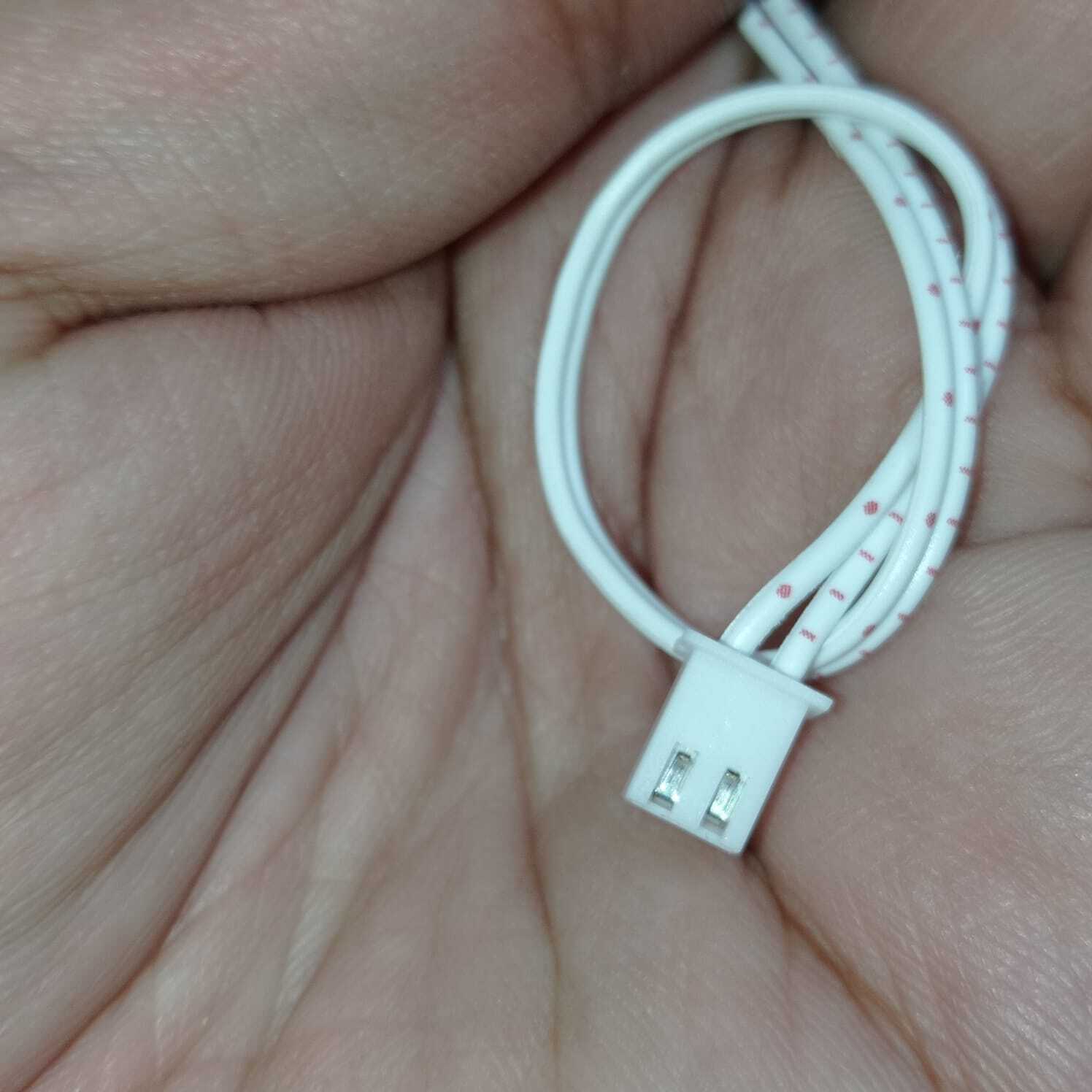 2 Wires 2.54mm Pitch Female JST Xh Connector Cable Wire - shown as a close-up of a white two-pin connector attached to two white wires held in a hand.
