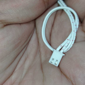 2 Wires 2.54mm Pitch Female JST Xh Connector Cable Wire - shown as a close-up of a white two-pin connector attached to two white wires held in a hand.