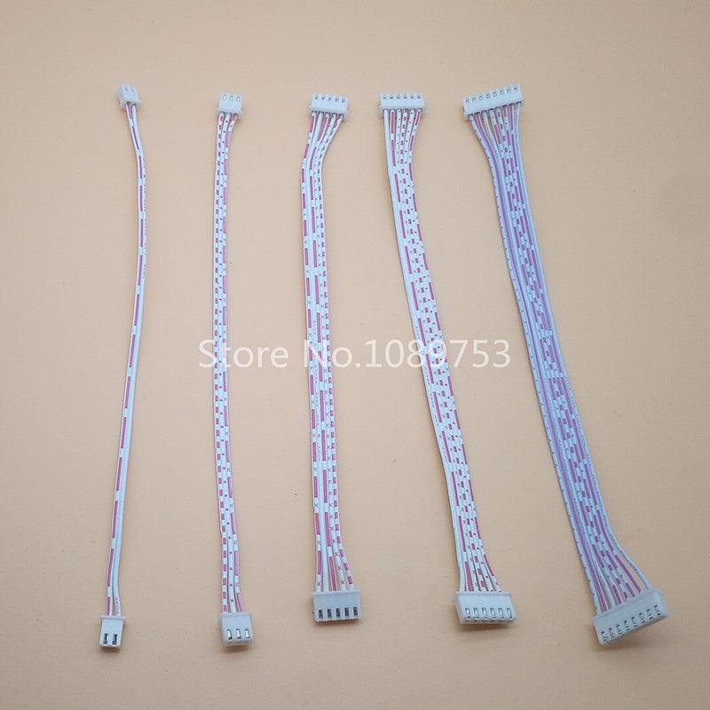 2 Wires 2.54mm Pitch Female To Female JST Xh Connector Cable Wire 26 to 30cm approximately - five white ribbon cables with multi-pin connectors at both ends.