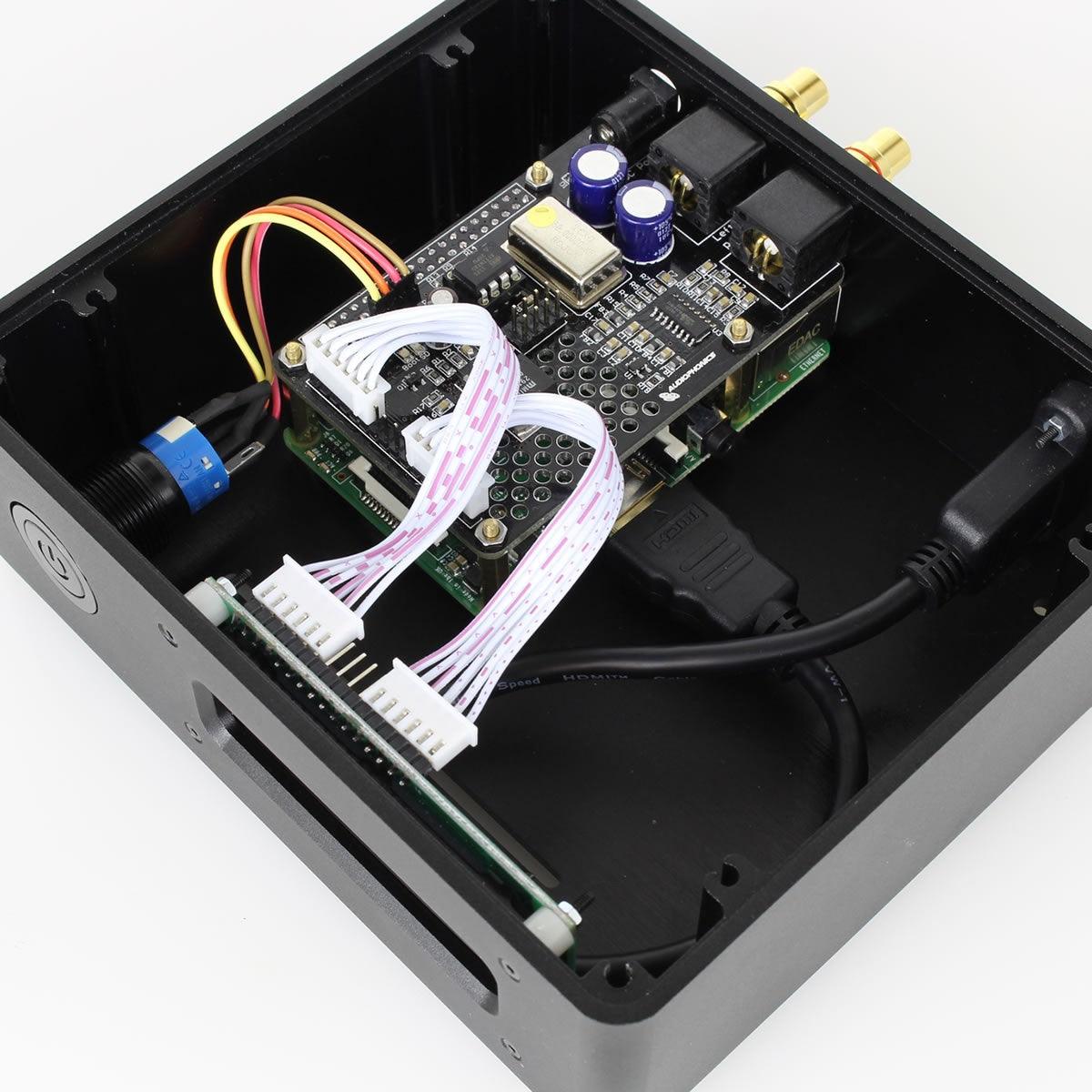 2 Wires 2.54mm Pitch Female To Female JST Xh Connector Cable Wire 26 to 30cm approximately - a white ribbon cable connecting a circuit board inside a black electronic enclosure.