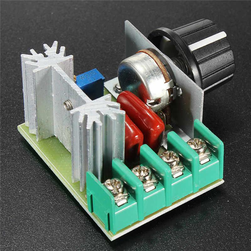 2000W 25A AC50-220V Adjustable AC Dimmer AC Heater Controller - a green circuit board with a silver heatsink, two red capacitors, a rotary knob, and terminal blocks.