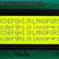 2004A LCD 20x4 Character LCD Green Backlight - a rectangular green display module with four rows of black alphabet characters and a top pin header.