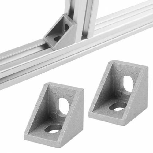 2020 Aluminum Profile l Bracket Corner Bracket - two grey metal corner brackets and one bracket mounted on an aluminum extrusion profile.
