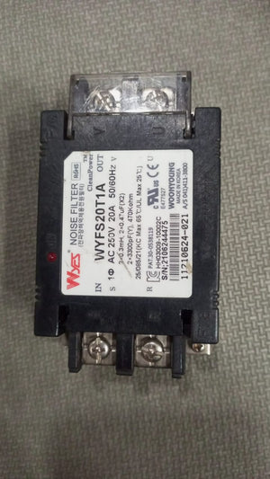 20A 220V WYFS20T1A Electrical Noise Filter - a black rectangular electronic component with four screw terminals and a central label displaying technical specifications.