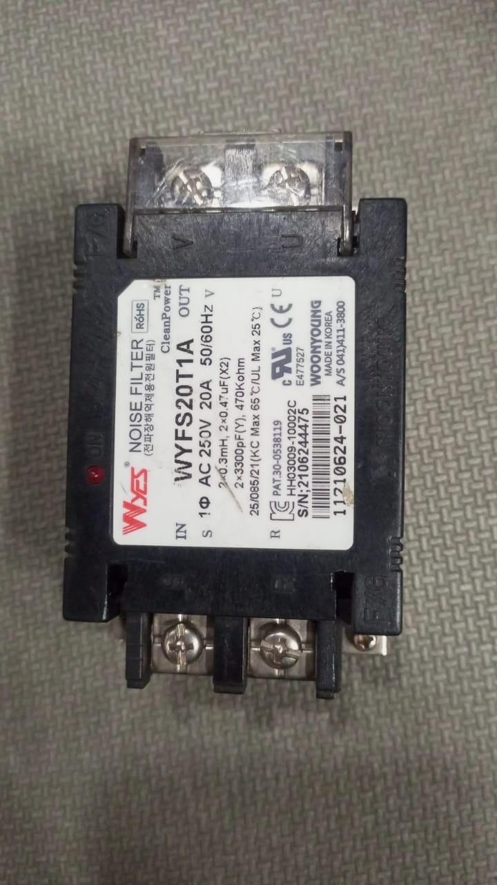 20A 220V WYFS20T1A Electrical Noise Filter - a black rectangular electronic component with four screw terminals and a central label displaying technical specifications.