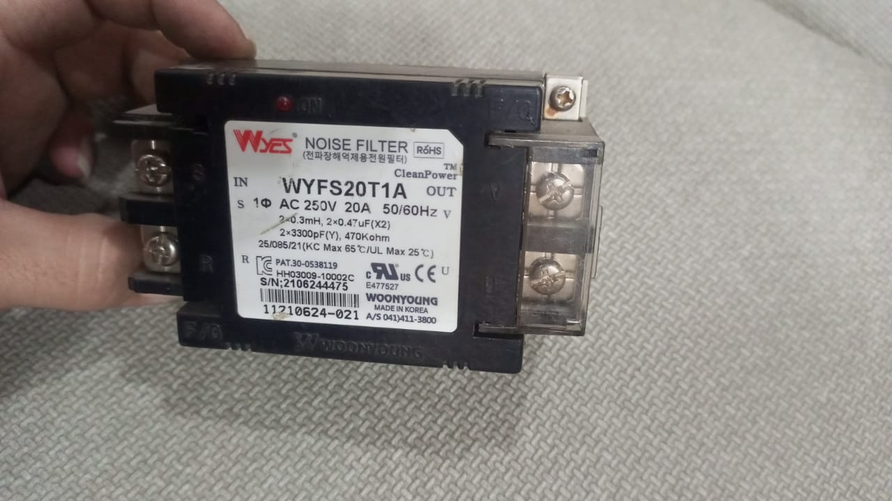 20A 220V WYFS20T1A Electrical Noise Filter - a black rectangular unit with screw terminals on the sides and a label detailing specifications and safety markings.