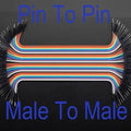 20cm Pin To Pin Jumper Wire Dupont Line 40 Pin Arduino Male To Male Jumper Wire - a multi-coloured ribbon cable with male pin connectors on both ends.