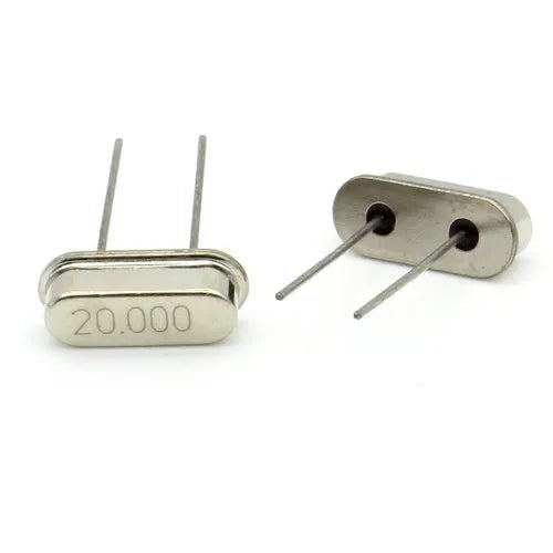 20MHz Crystal Oscillator - shown as two silver, oval-shaped metal components with two wire leads each, with one unit displaying the text 20.000.