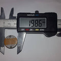 20mm LDR Sensor Light Dependent Resistor Sensor - being measured by a digital caliper showing a reading of 19.86 mm on its display.