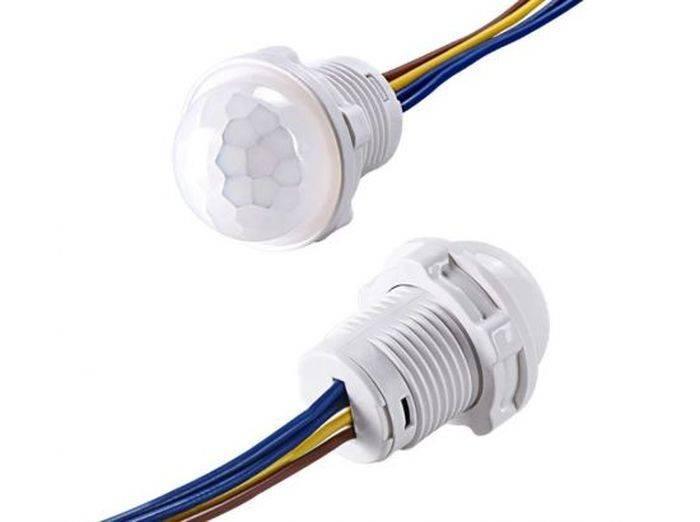 20mm Motion Sensor Light Switch - shown as two white, cylindrical sensors with dome-shaped lenses and attached brown, yellow, and blue wires.