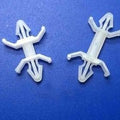20mm Xlb Nylon PCB Board Rivet Spacer - two white plastic fasteners with barbed ends and side wings against a blue background.
