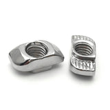 20XM4 T Nut Sliding T Nut Hammer Drop In Nut Fasten Connector M4 Series - two silver-colored metal T-nuts shown from different angles on a white background.