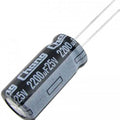 2200uF 25V Capacitor - a black cylindrical electrolytic capacitor with two metal wire leads and white text printed on its side.