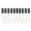 22uF 50V Electrolytic Capacitor - ten identical black cylindrical electrolytic capacitors with two wire leads each, arranged in a horizontal row.