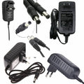 24V 0.5A DC Power Supply Adapter 2.1mm x 5.5mm Plug Used - a collage of black AC power adapters with various plug types and DC barrel connectors.