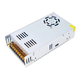 24V 20A Switching Power Supply SMPS - a rectangular silver metal unit featuring a top cooling fan, side ventilation slots, and a terminal block.