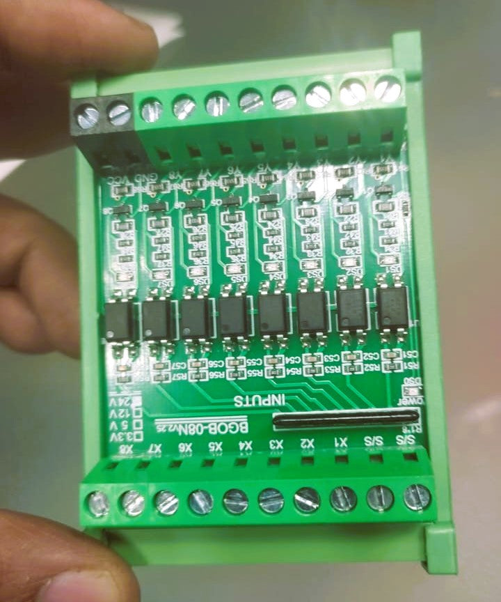24V 8 Channel Optocoupler Input Card - a green circuit board featuring eight terminal blocks, eight optocoupler chips, and input labels X1 through X8.