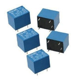 24V Coil T73 Relay 10 Amp Spdt 5 Pin Relay - shown as a group of five blue, cube-shaped electronic relays with visible metal pins on the underside.
