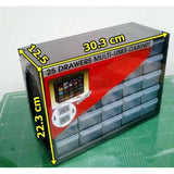 25 Section Cabinet Plastic Drawer Organizer Box Components Jewelry Box - a black cabinet with 25 clear plastic drawers and yellow dimension labels on a green cutting mat.