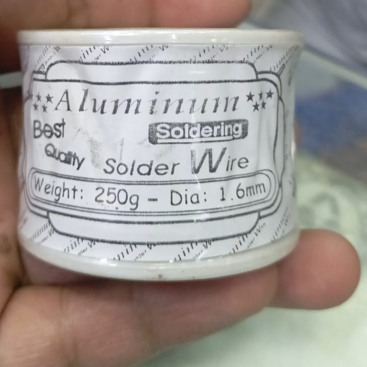 250 Gram 1.6mm Aluminium Best Quality Solder Wire - shown in a close-up product packaging shot with a white label detailing the weight and diameter.