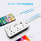 2500W Universal Power Extension With 4 Sockets 3 USB And 1 Type C Port Price - a white and black power strip charging two smartphones via USB cables.