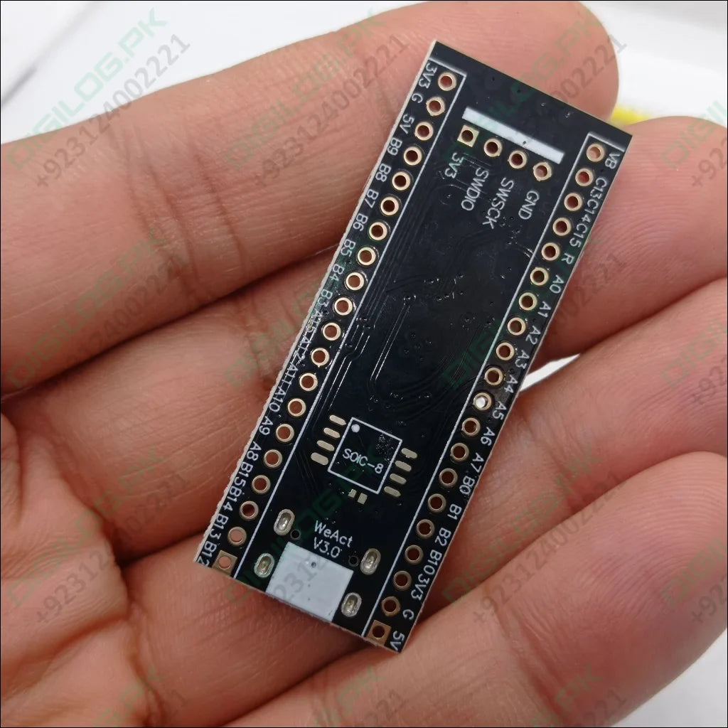 256KB ROM Back Pill Development Board STM32F401 STM32F401CCU6 IC V3.0 - Black Pill development board held in a hand, showing the black rectangular PCB with labeled pin headers and an SOIC-8 footprint.