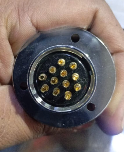 25mm 12 Pin Connector - a close-up view of the circular silver metal housing and the black interior face featuring twelve gold-plated contact pins.
