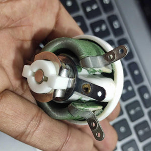 25W 1k Ohm High Power Wire Wound Potentiometer, Rheostat, Variable Resistor - a close-up of the ceramic body, coiled wire element, metal terminals, and a white plastic knob.