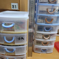 260mm x 180mm 140mm 5 Slot Organizer Box - shown with two stacked units, light blue handles, and a metal ruler measuring height against a wooden desk.