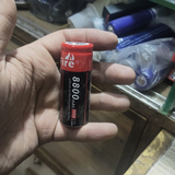 26650 Rechargeable Li-ion Battery Cell 4000mAh - held in a hand, showing a black and red cylindrical casing with printed text including 8800mAh and 26650.