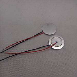 27mm Piezoelectric Ceramic Disc Piezo Element Plate With Wires - two circular silver-colored discs with attached red and black wires.