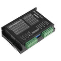 2DM542 Stepper Motor Driver - a black rectangular electronic module with a finned heat sink, green screw-terminal blocks, and a printed configuration table.
