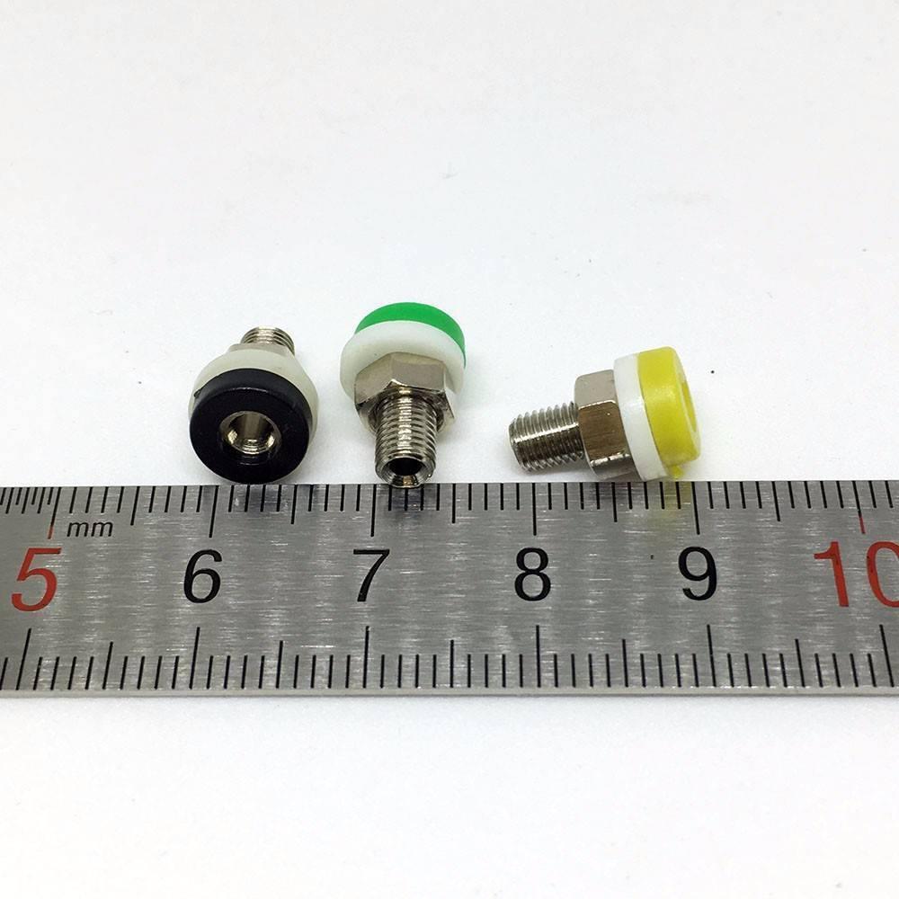 2mm Banana Female Socket Jack Connector For 2 mm Banana Plug Test - three units with black, green, and yellow caps placed on a metal ruler for scale.