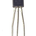 2N2222A Bipolar Junction NPN Transistor - a black, rectangular electronic component with three silver metal pins extending downward from its base.