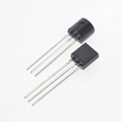 2N2222A Bipolar Junction NPN Transistor - shown as two black three-pin electronic components with flat and rounded faces on a white background.