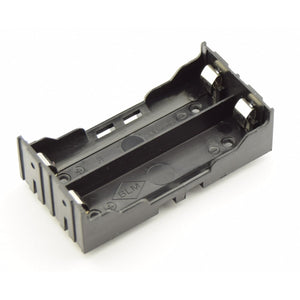 2x 18650 Battery Holder For PCB | Secure Battery Mount - a black plastic dual-slot battery mount with metal contact springs and printed "PARALLEL" and "BLM" markings.