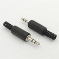 3.5mm Stereo Male Plug Jack DIY Solder Headphones Audio Connector - two black 3.5mm male audio plugs with flexible strain relief springs on a white background.