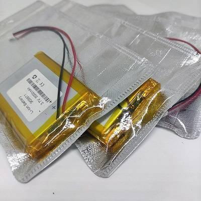 3.7V 5000mAh Lithium-ion Battery With JST 2.0mm Connector And BMS - shown as three rectangular yellow battery packs individually sealed in silver foil bags.