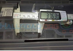 3 Digit 7 Segment Common Anode Red Color Display - being measured by a digital caliper showing a reading of 37.63 mm.