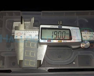 3 Digit 7 Segment Common Anode Red Color Display - shown being measured with digital calipers displaying 19.00 mm inside a plastic storage case.
