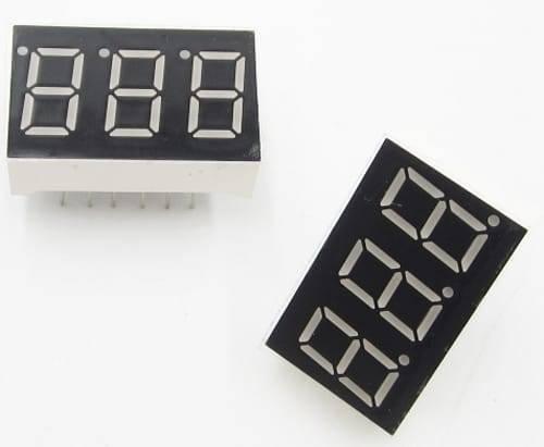 3 Digit Common Cathode 7 Segment LED Display - shown as two black rectangular modules with three numeric displays and decimal points on a white background.