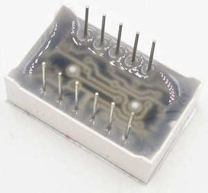 3 Digit Common Cathode 7 Segment LED Display - shown from the rear side with eleven metal pins protruding from a dark, resin-filled rectangular base.