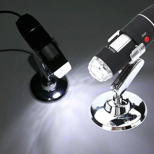 3 In 1 1600x Zoom 8 LED USB Microscope Digital Magnifier Endoscope Video Camera - two black digital microscopes on silver stands, one with a red button.