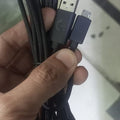 3 Meter Micro USB Data Cable - shown as a black braided cable with a USB-A connector featuring a G logo and a Micro-USB connector held in a hand.