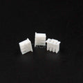 3 Pin JST Xh Female Connector 2.54mm Pitch - three small white plastic connector housings arranged on a black surface.